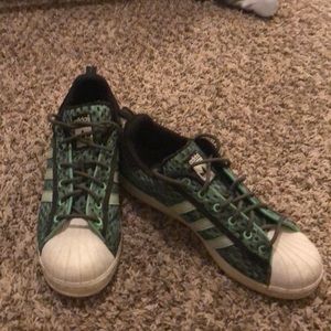 Glow in the dark lime green shell toe Adidas